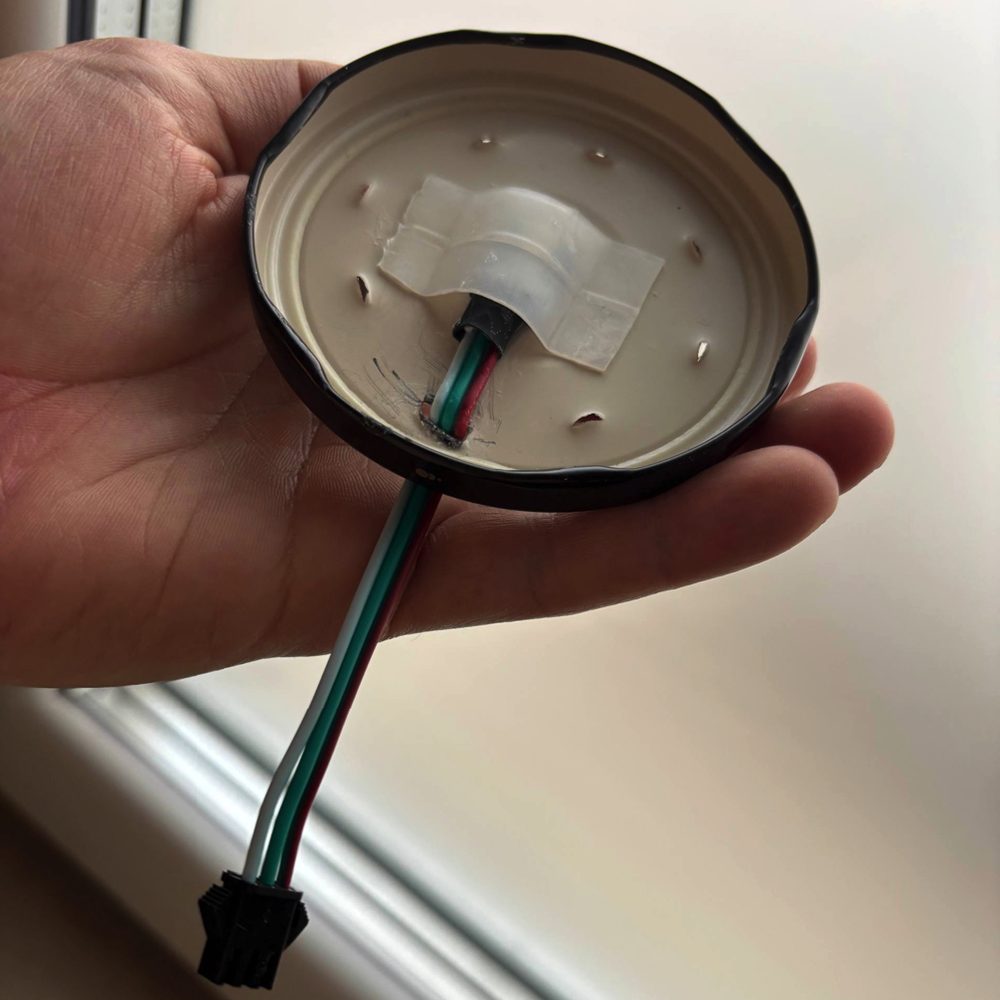 The jar lid with holes and LED configuration